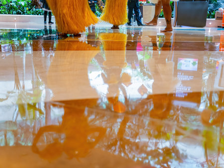 Macau, FEB 10 2013 - Interior view of a shopping mall with people dancing in Nanyang styleのeditorial素材