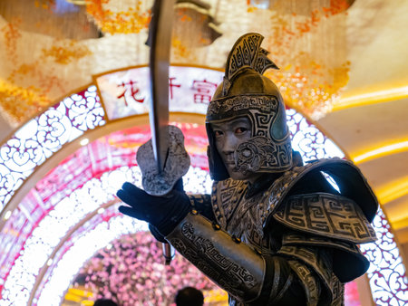 Macau, FEB 10 2013 - Man dress up in antqiue clothes in The Londoner Hotelのeditorial素材