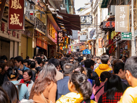 Macau, FEB 12 2013 - Many people walking near the Company Of Jesus Squareのeditorial素材