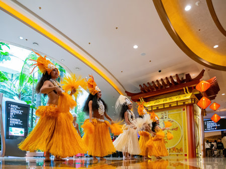 Macau, FEB 10 2013 - Interior view of a shopping mall with people dancing in Nanyang styleのeditorial素材