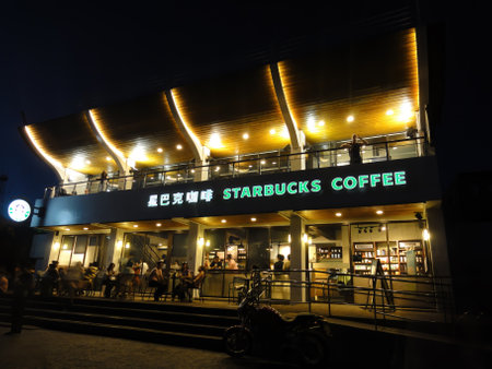 Taiwan, JUL 18 2010 - Night exterior view of a Starbucks Coffeeのeditorial素材
