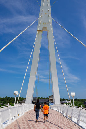 Taipei, FEB 11 2010 - Sunny view of the Lover's Bridge of Tamsui Fisherman's Wharfのeditorial素材