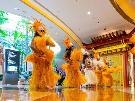Macau, FEB 10 2013 - Interior view of a shopping mall with people dancing in Nanyang styleのeditorial素材