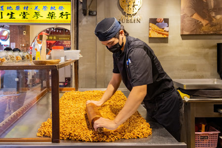 Taipei, JAN 3 2023 - People making food in the busy Dihua New Year Marketのeditorial素材