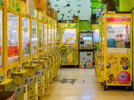 Tainan, JAN 4 2023 - Night interior view of a claw machine specialist storeのeditorial素材