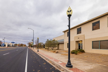 New Mexico, NOV 24 2022 - Overcast view of UFO shape lamp on the roadのeditorial素材
