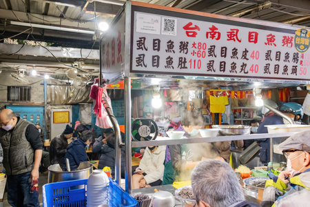 Taipei, DEC 17 2022 - Morning view of a Milkfish street vendor in the traditional Nanjichang Night Marketのeditorial素材