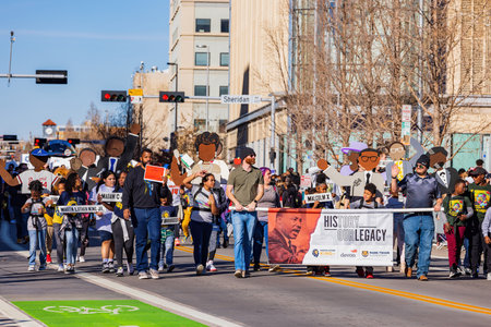 Oklahoma, JAN 15 2023 - A picturesque view of the Martin Luther King Jr. Day parade taking place in the downtown area of Oklahoma Cityのeditorial素材
