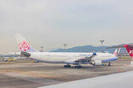 Texas, JAN 9, 2023 - Overcast view of China Airlines airplane parked at the Taipei Songshan Airportのeditorial素材