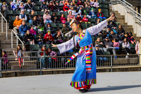 Oklahoma, JAN 21 2023 - Sunny view of  a woman dancer doing Chinese style danceのeditorial素材