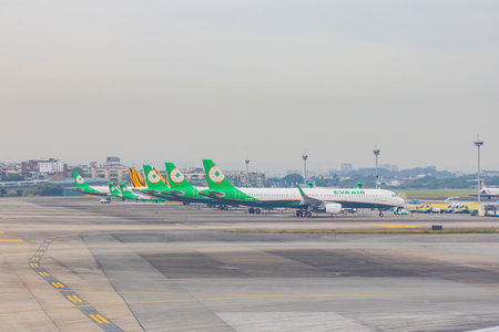Texas, JAN 9, 2023 - Overcast view of eva air airplane parked at the Taipei Songshan Airportのeditorial素材