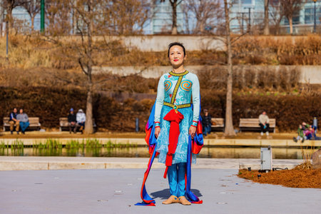 Oklahoma, JAN 21 2023 - Sunny view of  a woman dancer doing Chinese style danceのeditorial素材