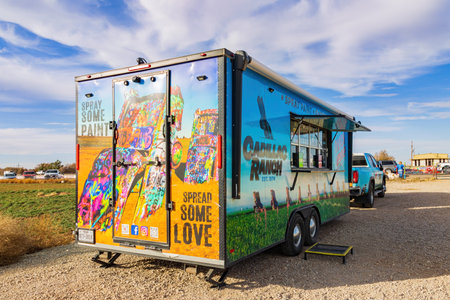 Texas, NOV 23 2022 - Sunny view of the spray selling truck of Cadillac Ranchのeditorial素材
