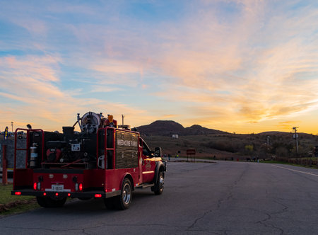 Oklahoma, APR 1 2023 - Sunset afterglow of Medicine Park fire truck