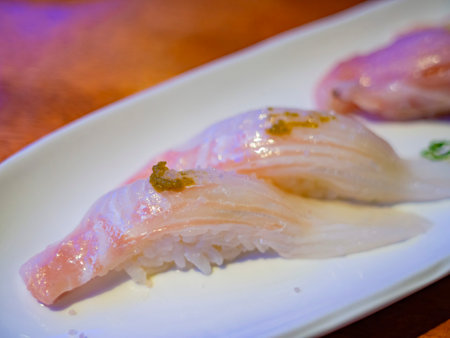 Close up shot of fresh raw sushi with fish at Los Angeles, Californiaの写真素材