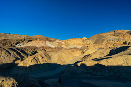 Sunny view of the landscape of the colorful Artist Drive at Death Valley National Park, Californiaの写真素材