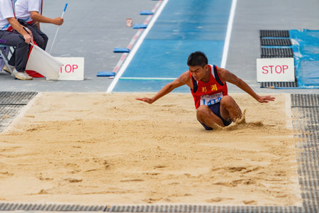 Taiwan, MAR 23 2013 - Long jump in The National Gamesのeditorial素材