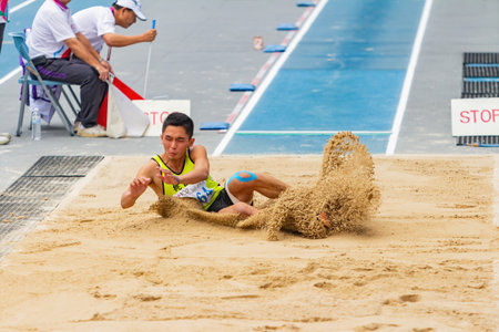Taiwan, MAR 23 2013 - Long jump in The National Gamesのeditorial素材