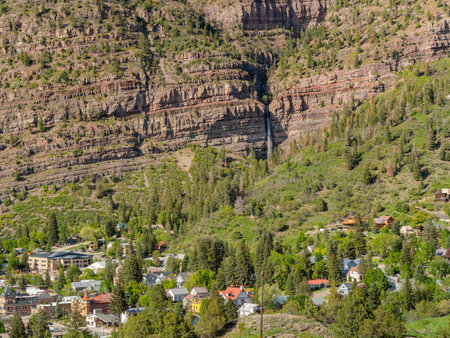 Sunny view of the Cascade Falls landscape and cityscape in Ouray at Coloradoの写真素材