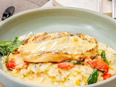 Close up shot of delicious risotto with fish steak at Oklahomaの写真素材