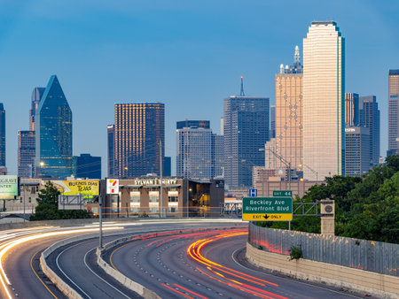 Texas, JUL 2 2023 - Sunset Dallas skyline with highwayのeditorial素材