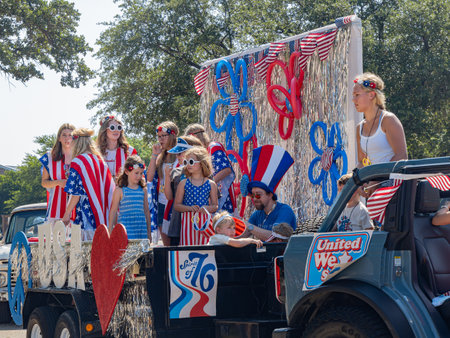 Texas, JUL 4 2023 - Sunny view of a July 4th community parade in Dallasのeditorial素材