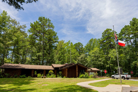 Texas, JUL 1 2023 - Sunny exterior view of the Park Headquarters of the Caddo Lake State Parkのeditorial素材