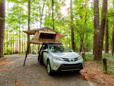Texas, JUL 2 2023 - Toyota RAV4 with roof top tent in Caddo Lake State Parkのeditorial素材