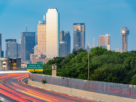 Texas, JUL 2 2023 - Sunset Dallas skyline with highwayのeditorial素材