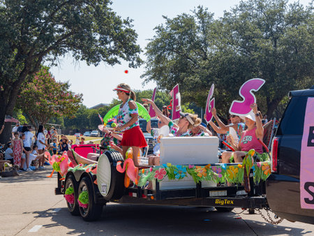 Texas, JUL 4 2023 - Sunny view of a July 4th community parade in Dallasのeditorial素材