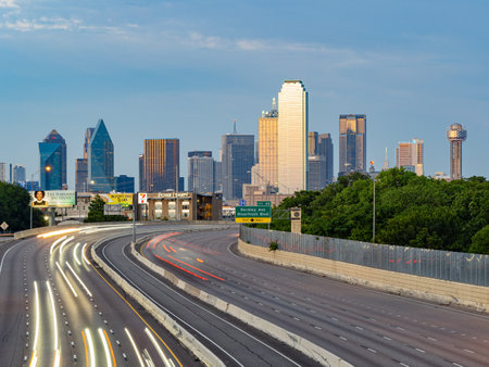 Texas, JUL 2 2023 - Sunset Dallas skyline with highwayのeditorial素材