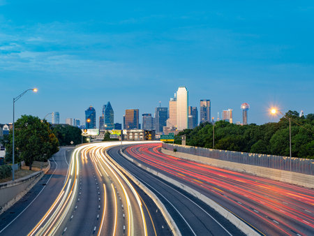 Texas, JUL 2 2023 - Sunset Dallas skyline with highwayのeditorial素材