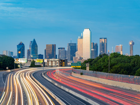 Texas, JUL 2 2023 - Sunset Dallas skyline with highwayのeditorial素材