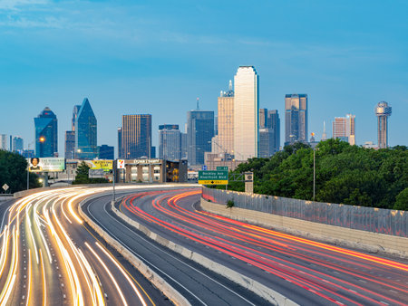 Texas, JUL 2 2023 - Sunset Dallas skyline with highwayのeditorial素材
