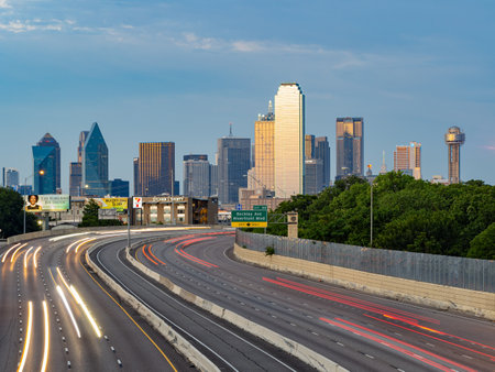 Texas, JUL 2 2023 - Sunset Dallas skyline with highwayのeditorial素材