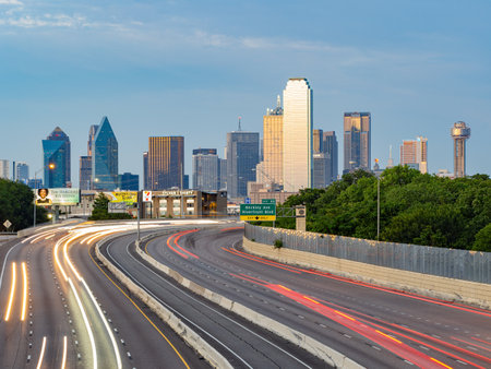 Texas, JUL 2 2023 - Sunset Dallas skyline with highwayのeditorial素材