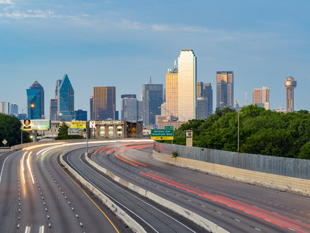 Texas, JUL 2 2023 - Sunset Dallas skyline with highwayのeditorial素材
