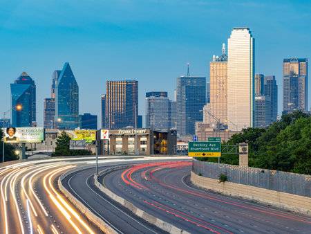 Texas, JUL 2 2023 - Sunset Dallas skyline with highwayのeditorial素材