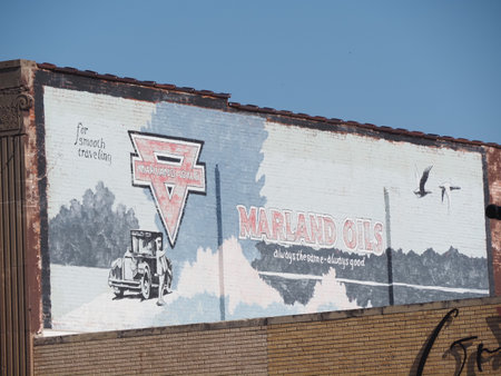 Oklahoma, AUG 19 2023 - Sunny exterior view of the Marland Oils signのeditorial素材