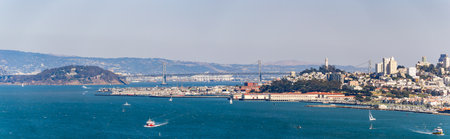 Sunny view of the cityscape, skyline with San Francisco Bay at San Francisco, Californiaの写真素材