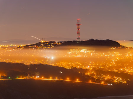 Twilight aerial view of the Golden Gate Bridge with fog at San Francisco, Californiaの写真素材