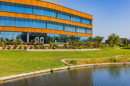 Sunny view of the Wayne and Kay Woodlsey Hall of Wichita State University at Kansasの写真素材