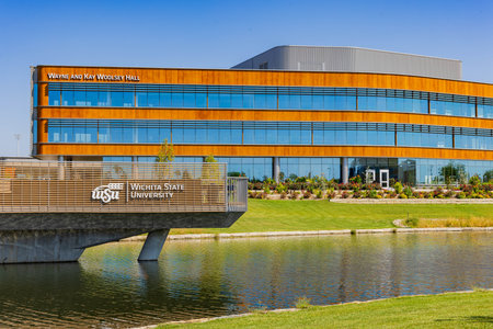 Kansas, SEP 17 2023 - Sunny view of the Wayne and Kay Woodlsey Hall of Wichita State Universityのeditorial素材