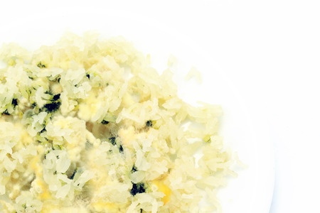 Moldy rice isolated white .の写真素材