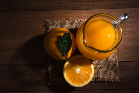 Orange juice on wood table.の写真素材