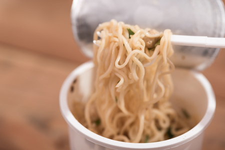 Noodle Cup,noodle soup in a cup,on wooden backgroundの写真素材