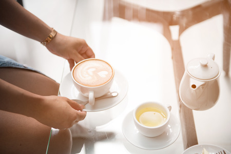 Latte art Coffee in coffee shopの写真素材