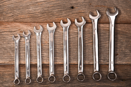 wrenches on wooden backgroundの写真素材
