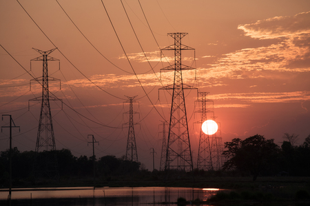 High voltage tower sunset backgroundの写真素材