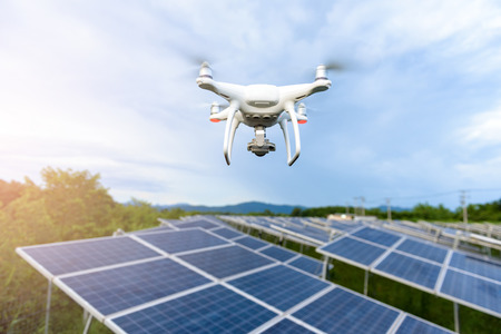 Drones flying over solar cellsの写真素材